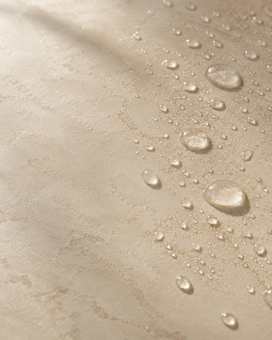 Water beading on a sealed microcement surface